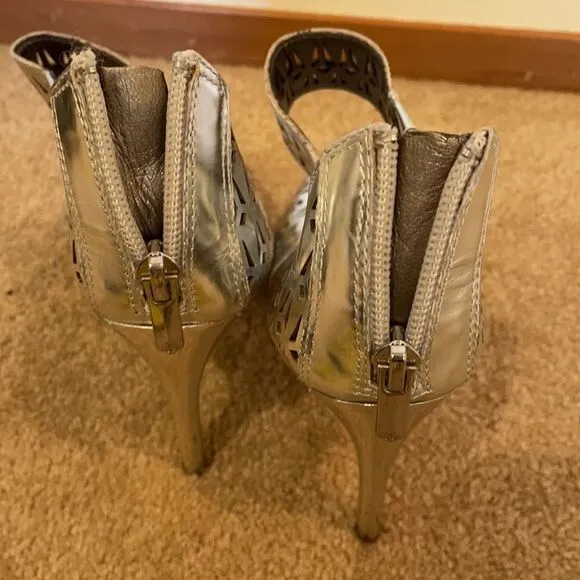 Sam Edelman silver cutout heels.