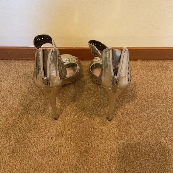 Sam Edelman silver cutout heels.