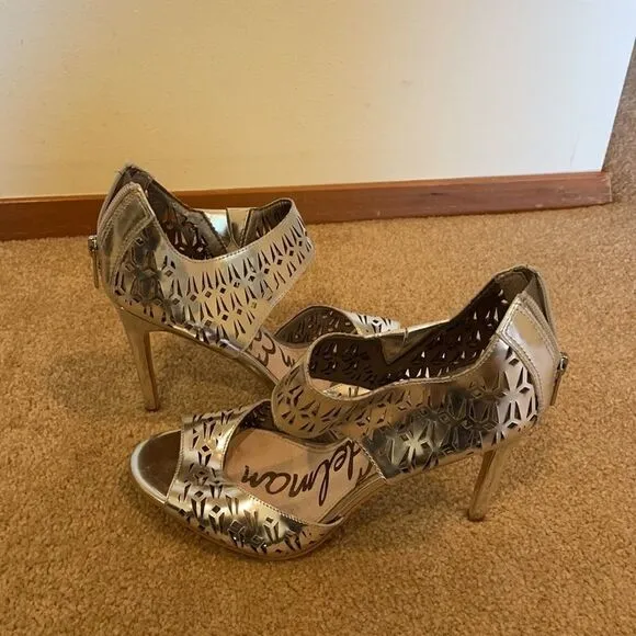 Sam Edelman silver cutout heels.