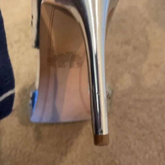 Sam Edelman silver cutout heels.